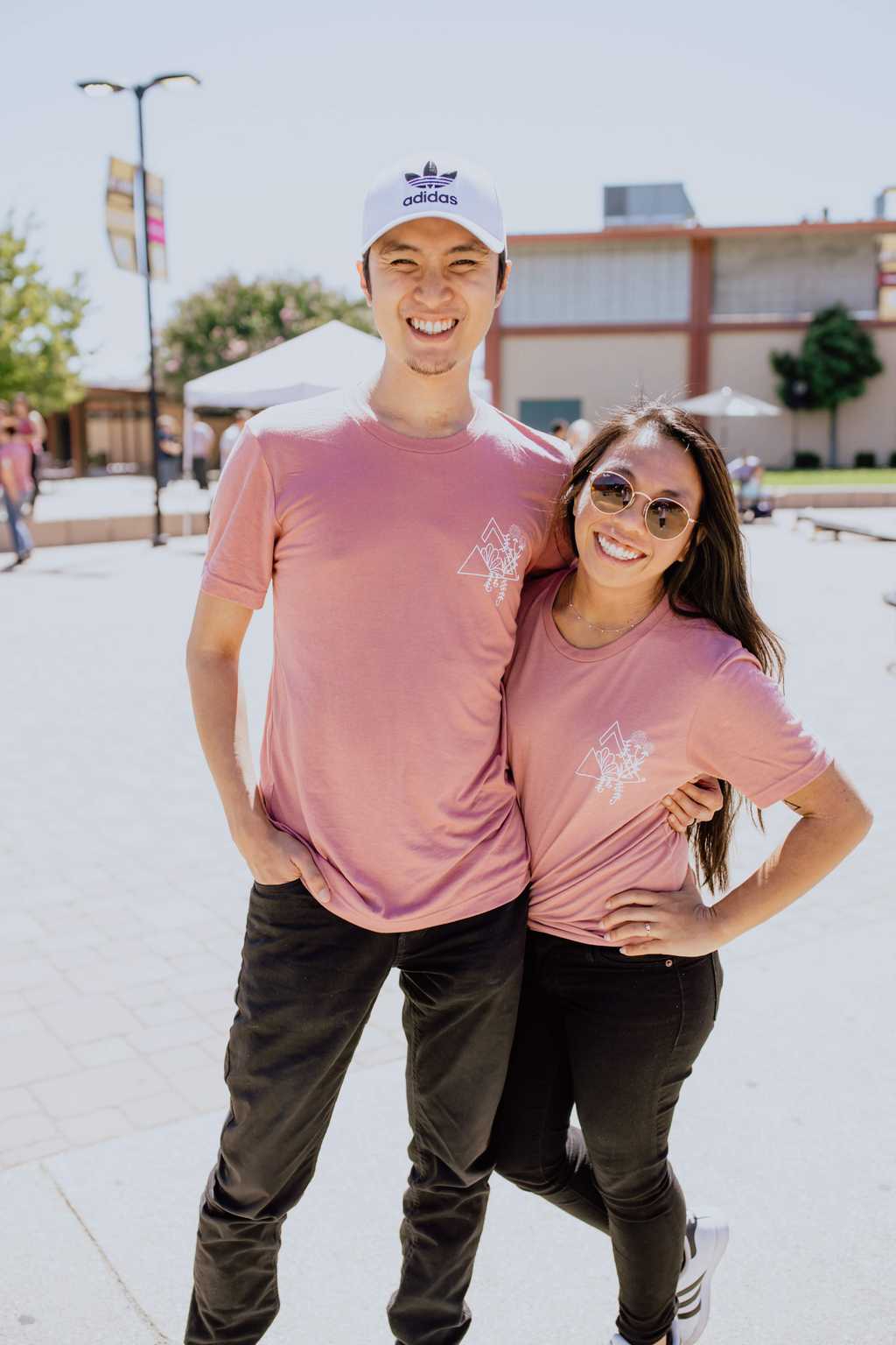 My wife and I wearing the Unseen Threads x Awakening floral shirt Photo of me and my wife wearing a shirt I designed.